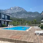 Palmiye Havuzlu Dag Manzarali Goeynuek Kemer Semesterbostad Antalya